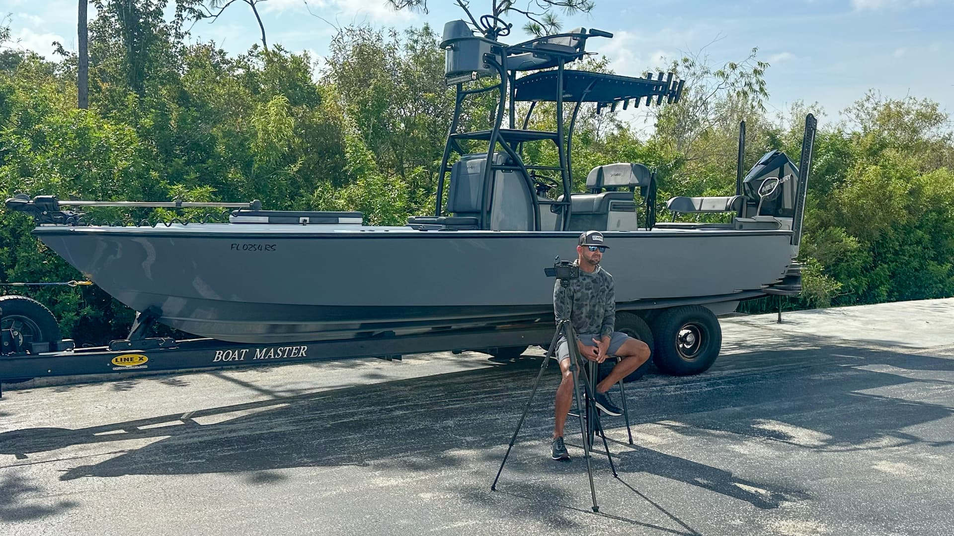 Captain Eric Davis at the helm of his bay boat